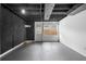 Finished basement with painted ceiling and walls, and concrete floor at 3228 Turtle Lake Se Dr, Marietta, GA 30067
