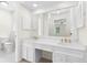 Bright bathroom featuring a toilet, a window and a bathtub with gold fixtures at 3228 Turtle Lake Se Dr, Marietta, GA 30067