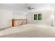 Large bonus room featuring plush carpeting, and a large window overlooking a green yard at 3228 Turtle Lake Se Dr, Marietta, GA 30067