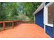 The exterior deck provides outdoor seating with views of the wooded backyard at 3228 Turtle Lake Se Dr, Marietta, GA 30067