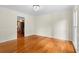 Open dining room features hardwood floors, chair rail, and elegant lighting at 3228 Turtle Lake Se Dr, Marietta, GA 30067