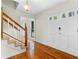 Bright foyer features hardwood floors, a staircase, and a double door front entry at 3228 Turtle Lake Se Dr, Marietta, GA 30067