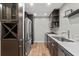 Modern kitchen with stainless steel appliances, wood cabinetry, and a bright countertop at 6851 Roswell Rd # H18, Atlanta, GA 30328