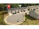 Aerial view of a community showcasing street, landscaping, and surrounding neighborhood at 1825 Villageside Ct, Lawrenceville, GA 30043
