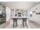 Modern kitchen featuring stainless steel appliances and a center island with seating at 1825 Villageside Ct, Lawrenceville, GA 30043