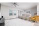 Bright living room featuring light-colored walls and hardwood floors at 1825 Villageside Ct, Lawrenceville, GA 30043