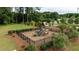 Community playground with swings, slide, and climbing structure at 1825 Villageside Ct, Lawrenceville, GA 30043