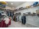 Spacious walk-in closet with ample shelving and storage solutions at 1825 Villageside Ct, Lawrenceville, GA 30043
