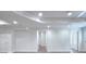 Spacious basement showcasing recessed lighting and door to outside at 2726 Riderwood Ne Ln, Marietta, GA 30062