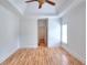 Airy bedroom with hardwood floors, tray ceiling, and access to en-suite bathroom at 2726 Riderwood Ne Ln, Marietta, GA 30062