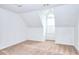 Bright bedroom featuring carpet, high ceilings and a window at 2726 Riderwood Ne Ln, Marietta, GA 30062
