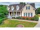 Charming two-story home with manicured landscaping and inviting front porch at 2726 Riderwood Ne Ln, Marietta, GA 30062