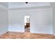 Spacious main bedroom with hardwood floors and ensuite bathroom entrance at 2726 Riderwood Ne Ln, Marietta, GA 30062