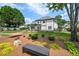 Back yard featuring mature trees, hammock and bench at 3065 Foxhall Overlook, Roswell, GA 30075