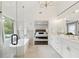 Bright bathroom featuring a walk-in glass shower, a soaking tub, and double vanity sinks at 3065 Foxhall Overlook, Roswell, GA 30075