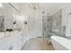 Elegant bathroom with a walk-in shower and double vanity sinks with a luxurious design at 3065 Foxhall Overlook, Roswell, GA 30075