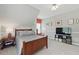 Comfortable bedroom featuring carpeted floors, and a mounted TV with entertainment center at 3065 Foxhall Overlook, Roswell, GA 30075