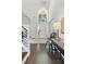 Bright foyer with hardwood floors, high ceilings, and a large window framing the outdoor view at 3065 Foxhall Overlook, Roswell, GA 30075