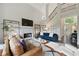 Spacious living room with fireplace, modern decor, and ample natural light at 3065 Foxhall Overlook, Roswell, GA 30075