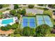 Aerial view of community tennis courts and pool at 3065 Foxhall Overlook, Roswell, GA 30075