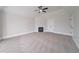 Bedroom featuring a ceiling fan, vaulted ceiling, and fireplace at 157 Hambrick Dr, Stockbridge, GA 30281