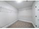 Walk-in closet with wire shelving for clothing and accessories at 157 Hambrick Dr, Stockbridge, GA 30281