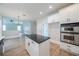 Modern kitchen featuring stainless steel appliances and a functional center island at 157 Hambrick Dr, Stockbridge, GA 30281