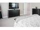 Comfortable bedroom featuring a plush bed and modern furniture at 2630 Timler Trce, Snellville, GA 30078