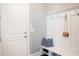 Functional mudroom with built-in storage, coat hooks, and seating, conveniently located near the entrance at 2630 Timler Trce, Snellville, GA 30078