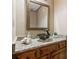 Bathroom vanity features granite countertops, wood cabinets, and a decorative bowl sink at 3267 Remembrance Trce, Lawrenceville, GA 30044