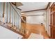 Elegant foyer featuring hardwood floors, decorative trim, and views into a spacious living area at 3267 Remembrance Trce, Lawrenceville, GA 30044
