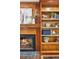 Close-up of the fireplace and built-in bookshelves in the living room at 3267 Remembrance Trce, Lawrenceville, GA 30044