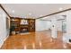 Large open living room with fireplace and built-in bookshelves at 3267 Remembrance Trce, Lawrenceville, GA 30044
