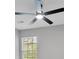 Bedroom features a modern ceiling fan and a window that brings in natural light at 3417 Sable Chase Ln, Atlanta, GA 30349