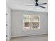 Simple bedroom with a ceiling fan and a window that lets in natural light at 3417 Sable Chase Ln, Atlanta, GA 30349