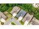 An aerial view of a landscaped brick home on a cul-de-sac with a dark gray roof at 1250 Atherton Park, Roswell, GA 30076