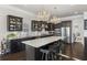 Spacious kitchen features a large island with bar seating and stainless steel appliances at 1250 Atherton Park, Roswell, GA 30076