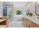Beautiful bathroom boasts double sinks, a soaking tub, and access to the shower at 12995 Bucksport Dr, Roswell, GA 30075