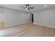 Spacious bedroom with hardwood floors and plenty of natural light at 12995 Bucksport Dr, Roswell, GA 30075