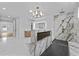 Spa-like bathroom features a large soaking tub, dual shower, and sleek design at 157 Shadburn Ferry Rd, Buford, GA 30518