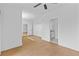 Bedroom featuring hardwood floors and access to an ensuite bathroom at 157 Shadburn Ferry Rd, Buford, GA 30518