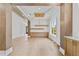 Spacious dining room with hardwood floors, custom cabinetry, and elegant lighting at 157 Shadburn Ferry Rd, Buford, GA 30518
