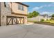 Attached garage with an extensive driveway, ample parking at 157 Shadburn Ferry Rd, Buford, GA 30518