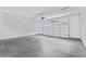 Spacious garage with high ceilings and a pristine concrete floor at 157 Shadburn Ferry Rd, Buford, GA 30518