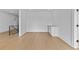 This office nook features hardwood floors, a white cabinet, and neutral paint at 157 Shadburn Ferry Rd, Buford, GA 30518