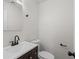 Clean, simple bathroom featuring a modern vanity and a minimalist aesthetic at 169 Peyton Sw Pl, Atlanta, GA 30311