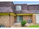Exterior view of a brick townhome with a secure gated entryway at 169 Peyton Sw Pl, Atlanta, GA 30311