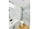 Modern bath with walk-in shower boasts eye-catching tile and sleek vanity at 4074 Green Hawk Trl, Decatur, GA 30035