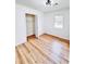 Bright bedroom with a closet, light hardwood floors and window at 4074 Green Hawk Trl, Decatur, GA 30035