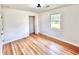 Bright bedroom with a closet, light hardwood floors and window at 4074 Green Hawk Trl, Decatur, GA 30035